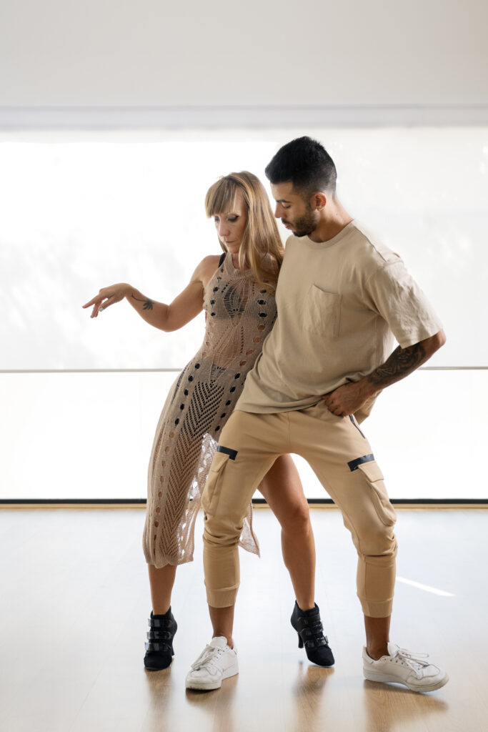 Modern dance couple in studio