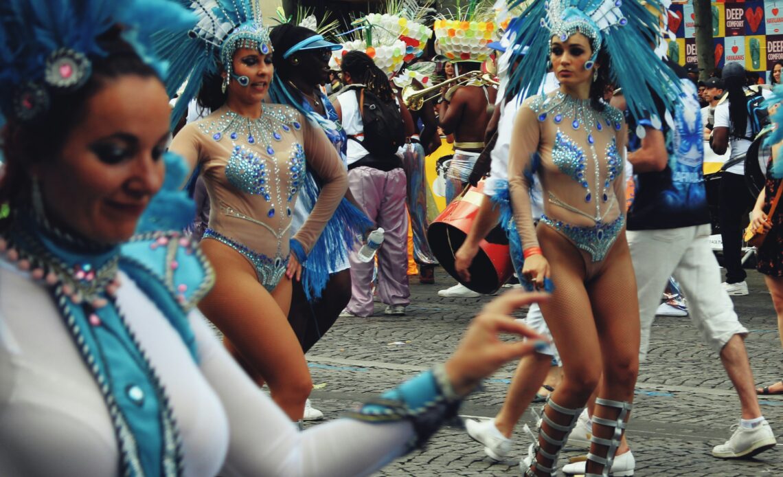 Dancers in colorful costumes at street parade