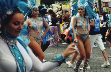 Dancers in colorful costumes at street parade